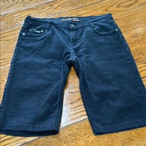 Vintage Southpole black denim shorts.  Juniors Size 9.  Logo on back pocket.